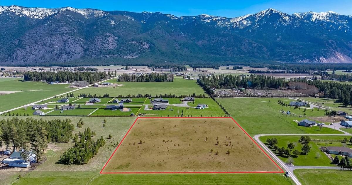 Aerial property photo with a red property lines map overlay