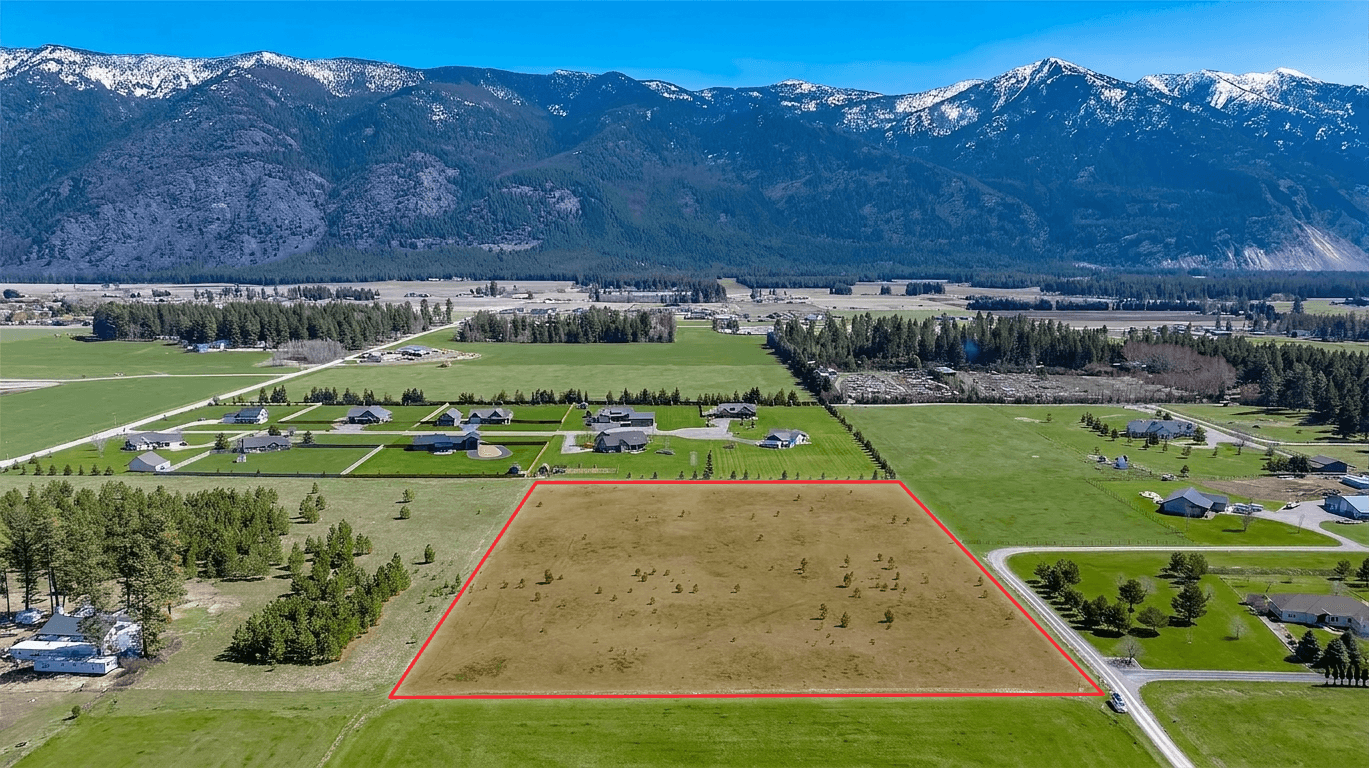 Aerial property photo with a red property lines map overlay